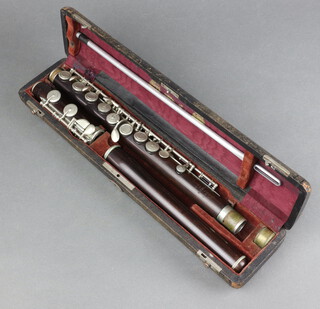 An A E Rittershausen Berlin, J.R. Lafleur and Son London rosewood 3 piece flute, cased 