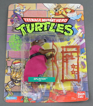 Teenage Mutant Hero Turtles, an original Playmates Bandai carded and unpunched figure of Splinter (5006) with Woolworths sticker