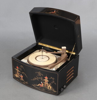 A 1954 PYE 45rpm record player "The Black Box - Deluxe" in a fitted lacquered Chinoiserie case, complete with manual and promotional leaflet