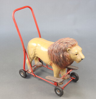 Triang, a child's composition and tubular metal push-a-long model lion 60cm h x 48cm w x 25cm d  