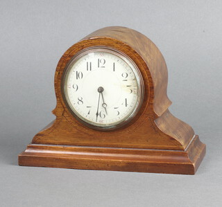 A French bedroom timepiece with 8cm enamelled dial, Arabic numerals, contained in inlaid mahogany case, the back plate marked C & Co, Made in France, complete with key 16cm h x 21cm w x 8cm d 