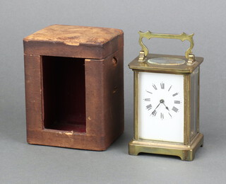 A 19th Century 8 day carriage timepiece with enamelled dial and Roman numerals, contained in a gilt metal case 11cm h x 8cm w x 6cm d, complete with leather travelling case 