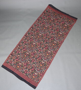 A Karandi fabric embroidered shawl 229cm x 95cm with all over floral design 