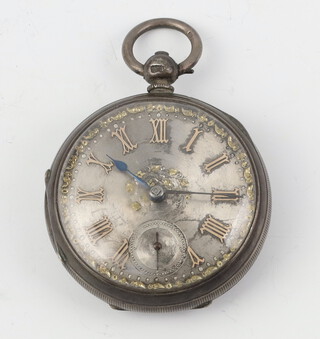 A Victorian silver key wind pocket watch with engraved champagne dial and seconds at 6 o'clock, 50mm, the movement indistinctly signed, Chester 1883 