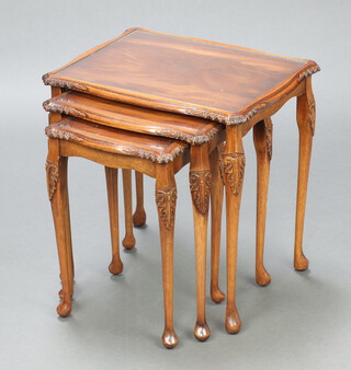 A nest of 3 Chippendale style rectangular carved mahogany interfitting coffee tables with plate glass tops, raised on cabriole supports 54cm h x 53cm w x 40cm d 