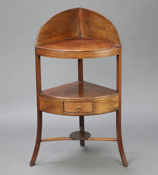 A Georgian mahogany corner wash stand with raised back and undertier, fitted a drawer, raised on outswept supports 102cm h x 57cm w x 40cm d 