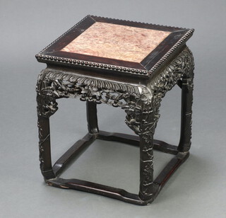 A Chinese square carved and pierced hardwood jardiniere stand inset a pink veined marble top 42cm h x 35cm w x 35cm d  