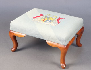 A hardwood stool with Berlin woolwork seat and armorial decoration to the centre, 30cm h x 56cm w x 43cm d 