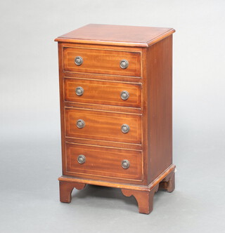 A Georgian style inlaid and crossbanded mahogany chest of 4 long drawers, raised on bracket feet 74cm h x 41cm w x 36cm d  