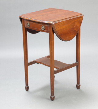 An Edwardian oval mahogany drop flap occasional table with undertier, fitted a frieze drawer, raised on square supports ending in spade feet 71cm h x 39cm w x 47cm d  
