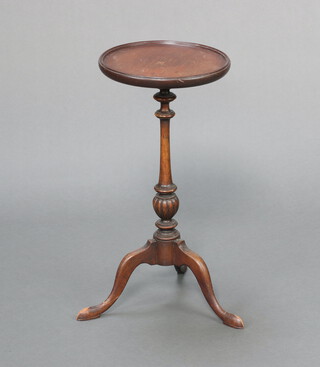 A Georgian style circular bleached mahogany wine table raised on pillar and tripod base 59cm h x 29cm  