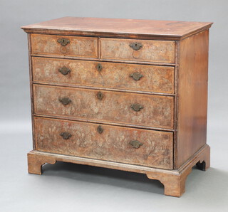 A Queen Anne style feather banded and quarter veneered chest or 2 short and 3 long drawers with replacement brass drop handles and steel locks, raised on bracket feet 95cm h x 105cm w x 58cm d  