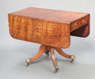 A Georgian mahogany pedestal Pembroke table fitted a frieze drawer, raised on turned column and tripod base ending in brass caps and casters 71cm h x 99cm w x 50cm d 