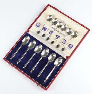 A cased set of 6 silver coffee spoons London 1953 and 6 bean end coffee spoons Birmingham 1930, 108 grams 