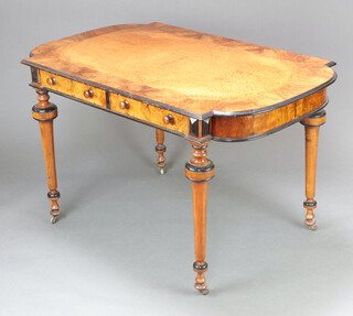 A Victorian quarter veneered burr walnut and crossbanded centre table with ebonised decoration to the edge, fitted 2 drawers with turned handles, raised on cup and cover supports 75cm h x 123cm w x 76cm d 