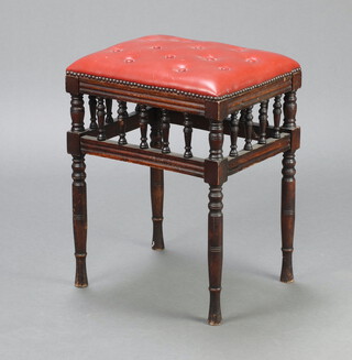 A Victorian rectangular mahogany stool, the seat upholstered in red buttoned material, raised on turned supports with bobbin turned decoration 50cm h x 40cm w  x 32cm d 