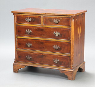 A Georgian style crossbanded and quarter veneered yew chest of 2 short and 3 long drawers, raised on bracket feet 73cm h x 77cm w x 41cm d 