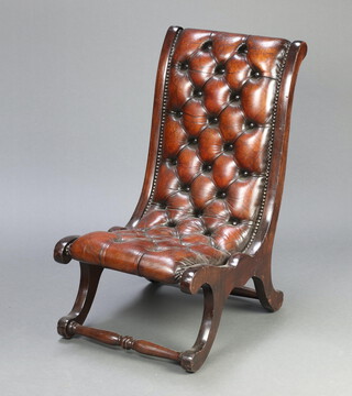 A 19th Century style mahogany show frame slipper/nursing chair upholstered in brown buttoned leather 77cm h x 43cm w x 50cm d (seat 20cm x 30cm) 