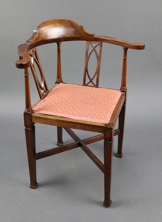 An Edwardian mahogany slat back corner chair with upholstered seat, raised on square supports with X framed stretcher 75cm h x 60cm w x 40cm d (seat 28cm x 34cm) 