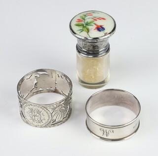 A silver and guilloche enamel toilet jar together with 2 silver napkin rings 