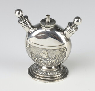A silver plated cigarette lighter of moon shape, the repousse decoration with a butterfly amongst flowers, the base engraved MacMichael to the Queen, 42 South Audley Street 10cm