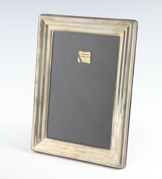 A rectangular silver photograph frame 19cm x 13cm, rubbed marks, boxed 