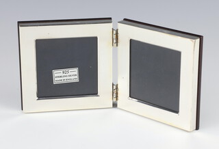 A folding silver photograph frame Sheffield 2010, 10cm, boxed 
