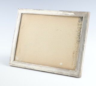 A rectangular silver photograph frame 23cm x 18cm 