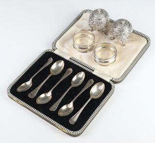 A cased set of 6 silver coffee spoons Sheffield 1942, 2 napkin rings and 2 Indian condiments 225 grams 