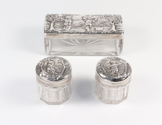 A Victorian rectangular silver mounted toilet jar decorated with cavorting cherubs 9cm, 2 circular ditto London 1887 