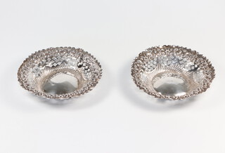 A pair of Victorian pierced silver circular bon bon dishes Birmingham 1897, 43 grams, 9cm 