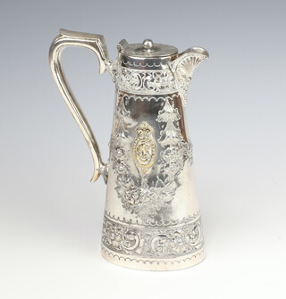 An Edwardian repousse silver plated ewer with lid, with an applied badge - Crufts Dog Show by J H Potter of Sheffield, 25cm 