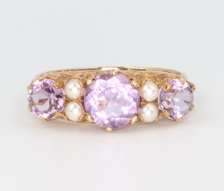 A 9ct yellow gold amethyst and seed pearl ring 3.1 grams, size Q 1/2