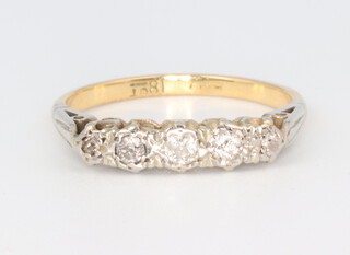 A yellow metal 18ct 5 stone diamond ring, approx. 0.2ct, 2.9 grams, size M 1/2