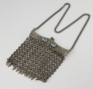 An Art Nouveau silver plated repousse mesh purse with enamelled bead decoration 