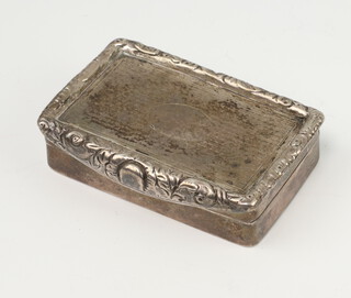 A George IV silver rectangular snuff box with engine turned decoration and scroll rim, London 1821, maker Joseph Willmore 