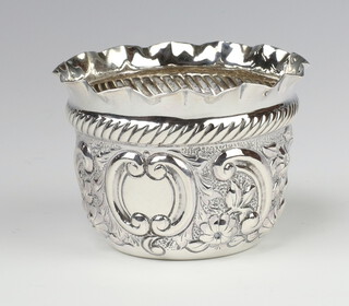 A Victorian repousse silver bowl decorated flowers and scrolls London 1897, 63 grams, 6cm 