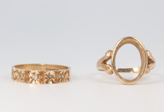 A 9ct yellow gold diamond set wedding band size M, 1.8 grams and a yellow metal ring (lacking stones) size N, 2.7 grams 
