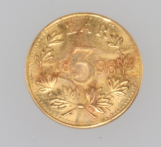 A replica 1898 yellow metal South African 3 Pence Sammy Marks "Tickey", 3 grams