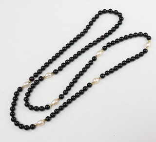 An onyx and baroque cultured pearl necklace 74cm