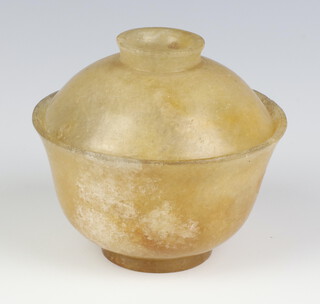 A 19th Century Qing Dynasty beige hardstone bowl and cover with slightly spreading foot and a round body, with light inclusions, 10cm 