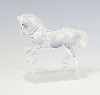 A Swarovski Crystal figure of a standing horse raised on an octagonal base 9cm 