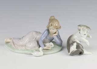 A Lladro group of a girl with goslings 5609 17cm, ditto of a cat with mouse 8cm 