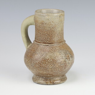 A 17th/18th Century tiger ware jug 13cm 