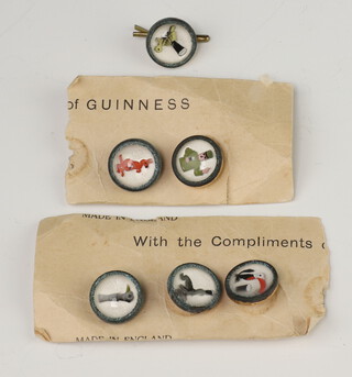 Six Guinness advertising buttons 