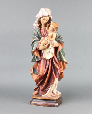 Toni Baur, 20th Century carved figure of The Standing Virgin Mary and Infant Christ, 57cm h x 16cm w x 14cm d 