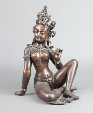 A bronze figure of a seated Indian Goddess  35cm x 26cm x 23cm 