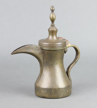 An Arabic Dallah coffee pot with oval mark to side 26cm x 11cm 