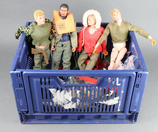 A collection of 4 Action Man figures together with numerous outfits including Guardsman and accessories including Special Operations kit  