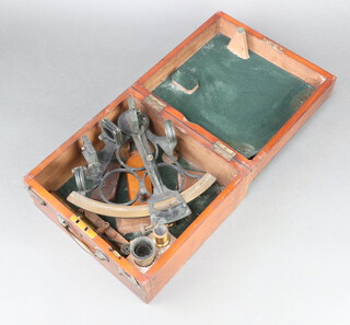 S D Neill Ltd, Belfast, a 19th/20th Century sextant boxed, some light verdigris (parts move) 